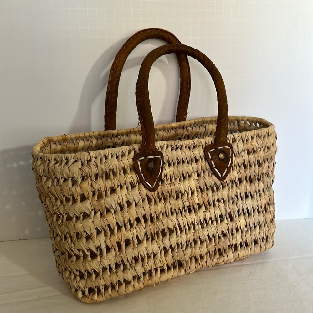Woven handbag tote with leather handles 12”W, 8”H, 6” D, 12” drop open top